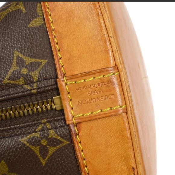 Louis Vuitton Alma Monogram Handbag - Picture 9 of 10